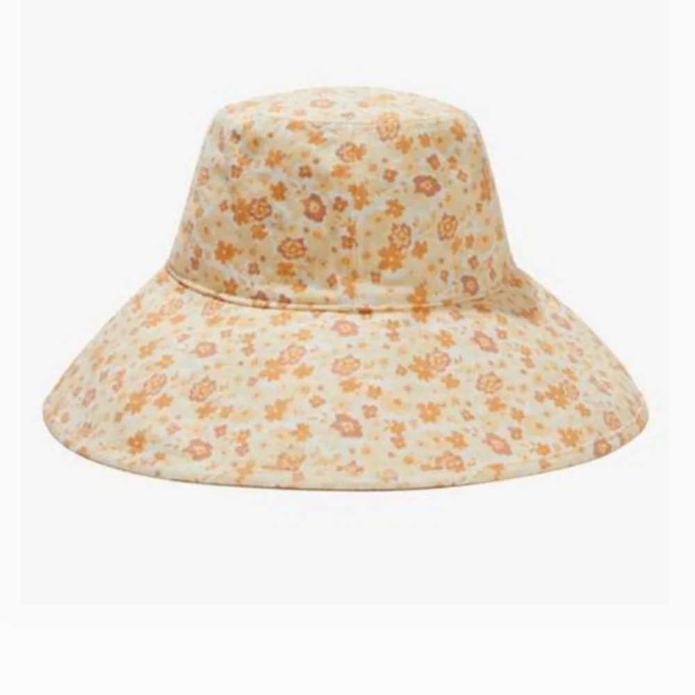 Lack Of Color Floral Wide Brim Bucket Hat in Cream and Orange - Picture 1 of 7